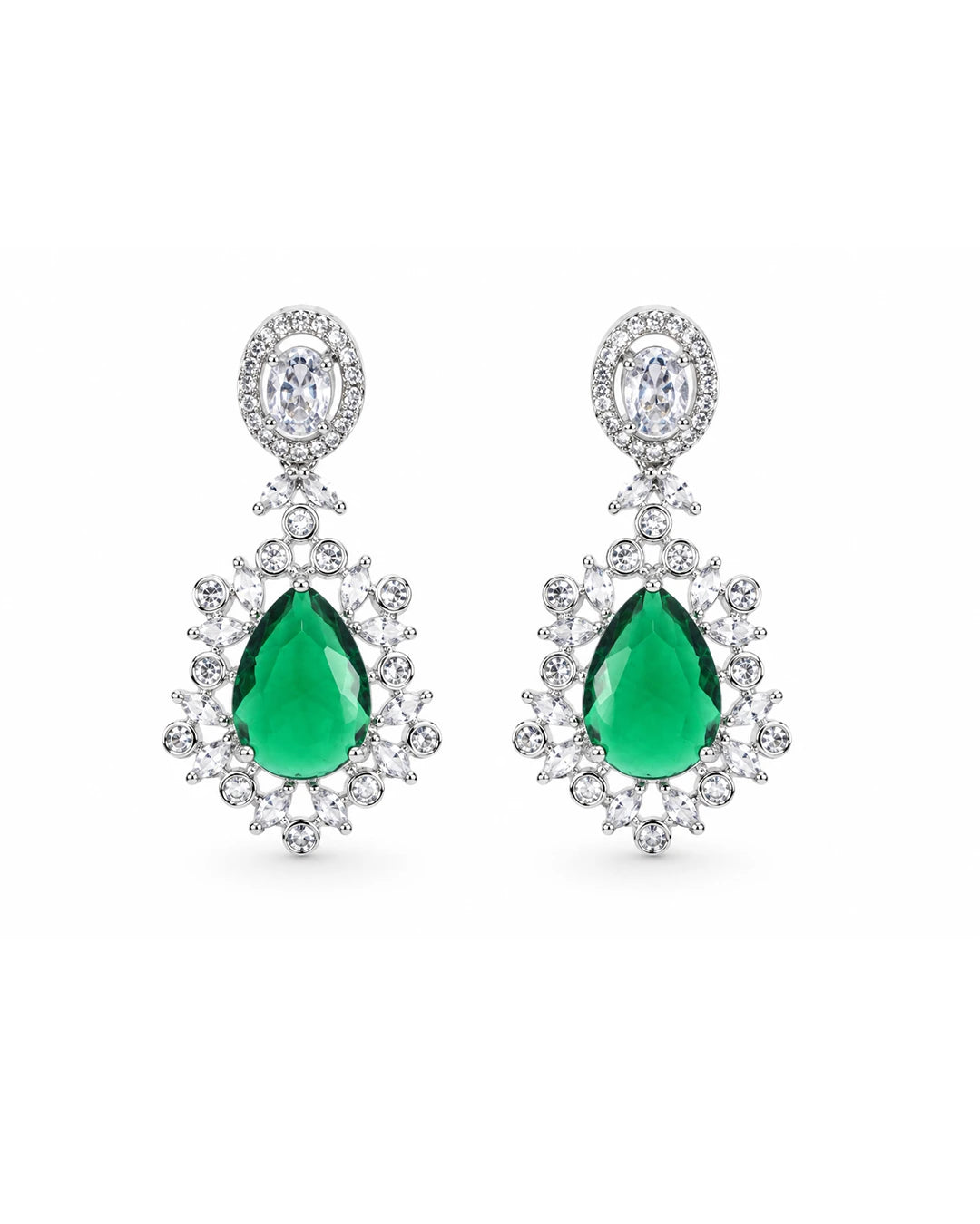 Pair of earrings with green gemstones and diamond-like stones on a white background