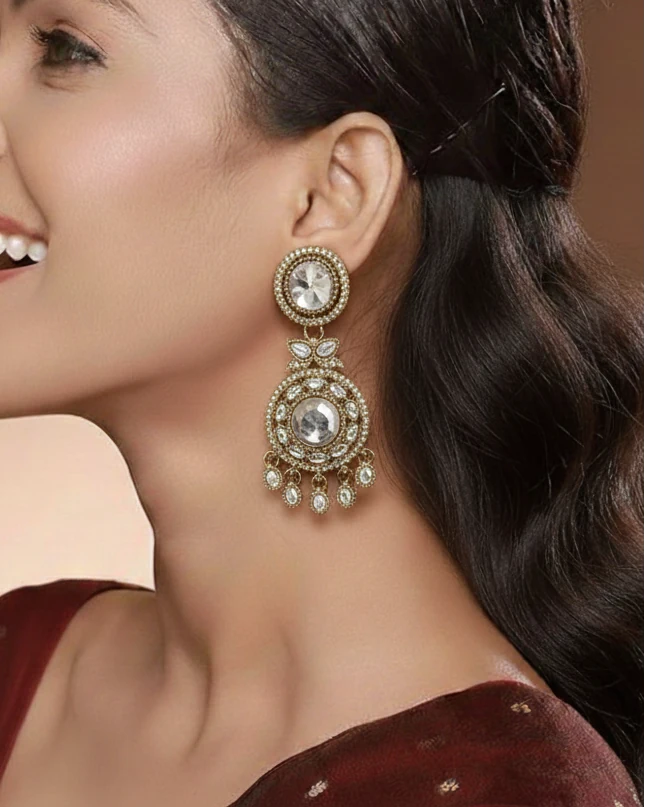 Close-up of a woman wearing a decorative earring with a blurred background