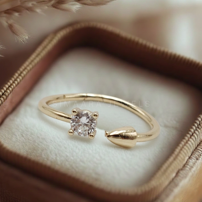 Golden ring with a diamond in a jewelry box