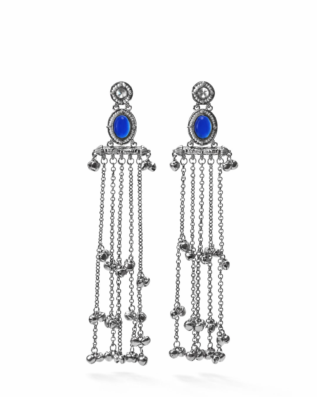 Pair of silver earrings with blue stones on a white background