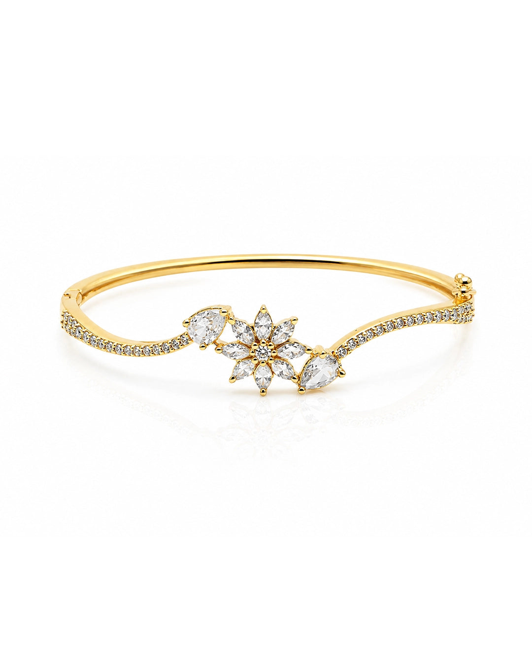 Gold bracelet with diamond accents on a white background