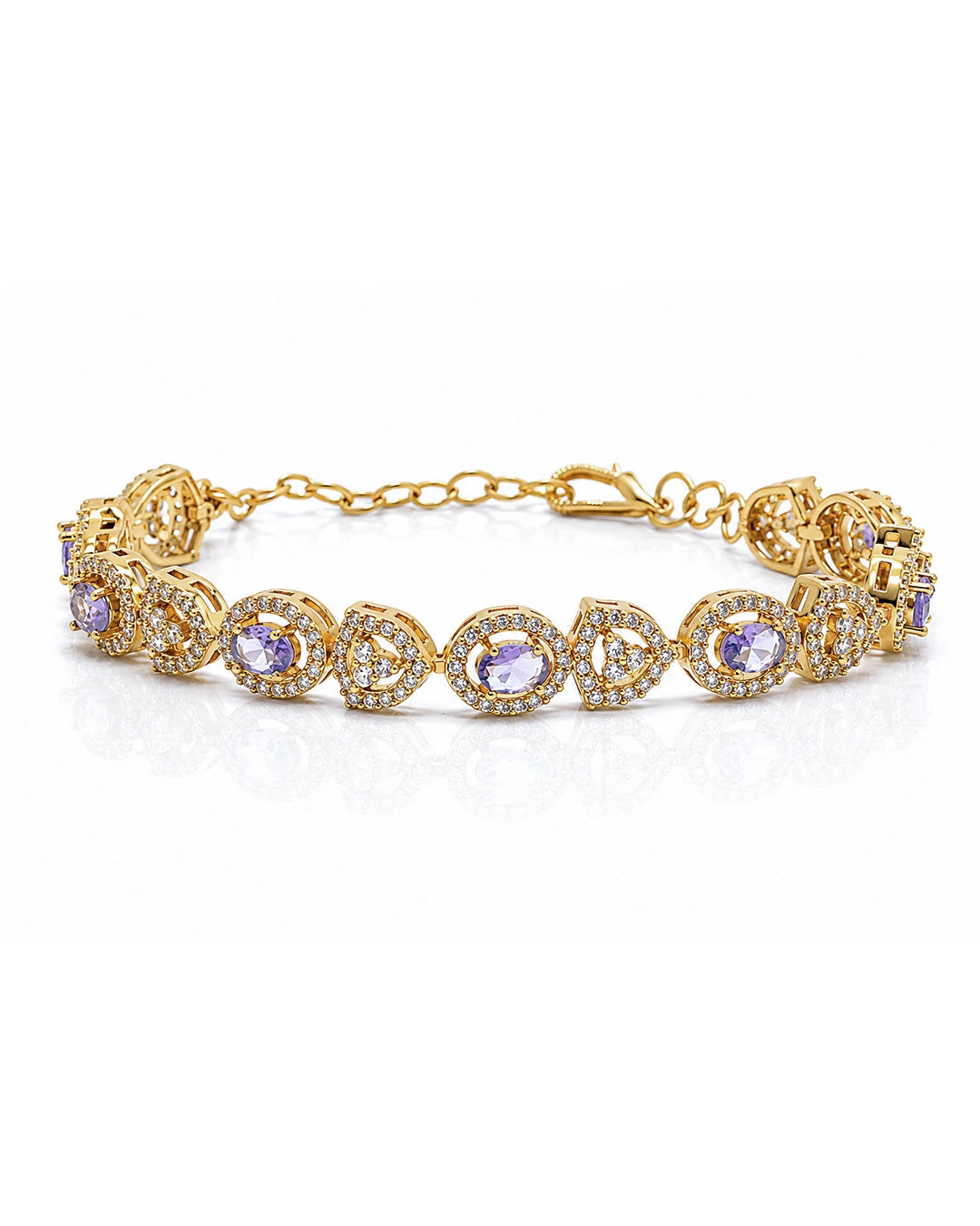 Gold bracelet with purple gemstones on a white background
