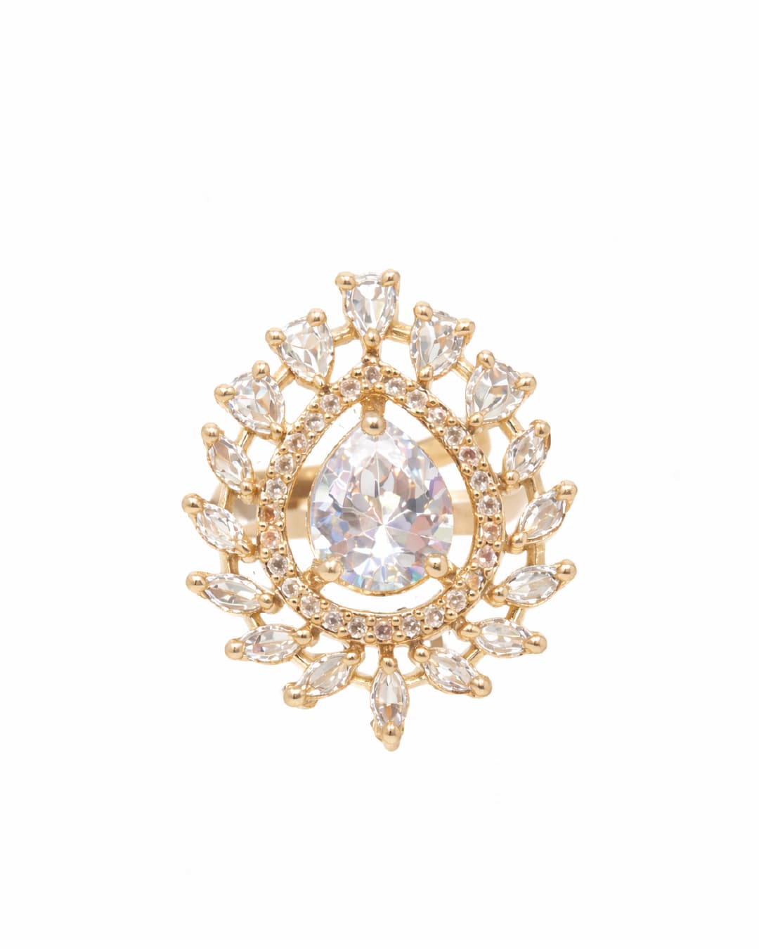 Gold brooch with a central teardrop-shaped gemstone on a white background