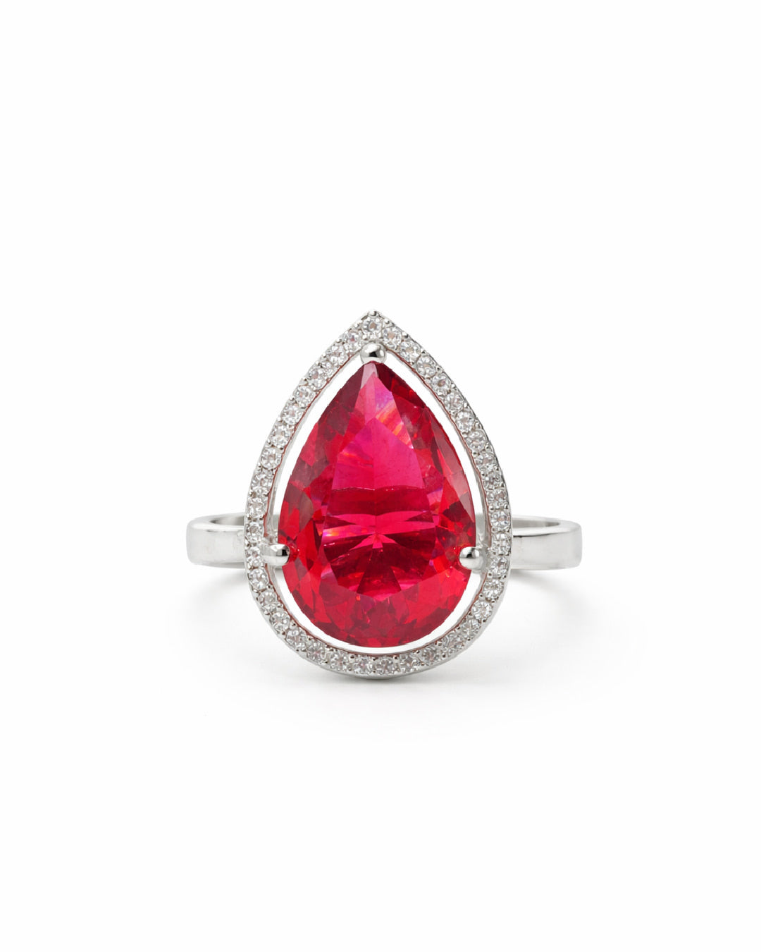Ring with a red teardrop-shaped gemstone on a white background